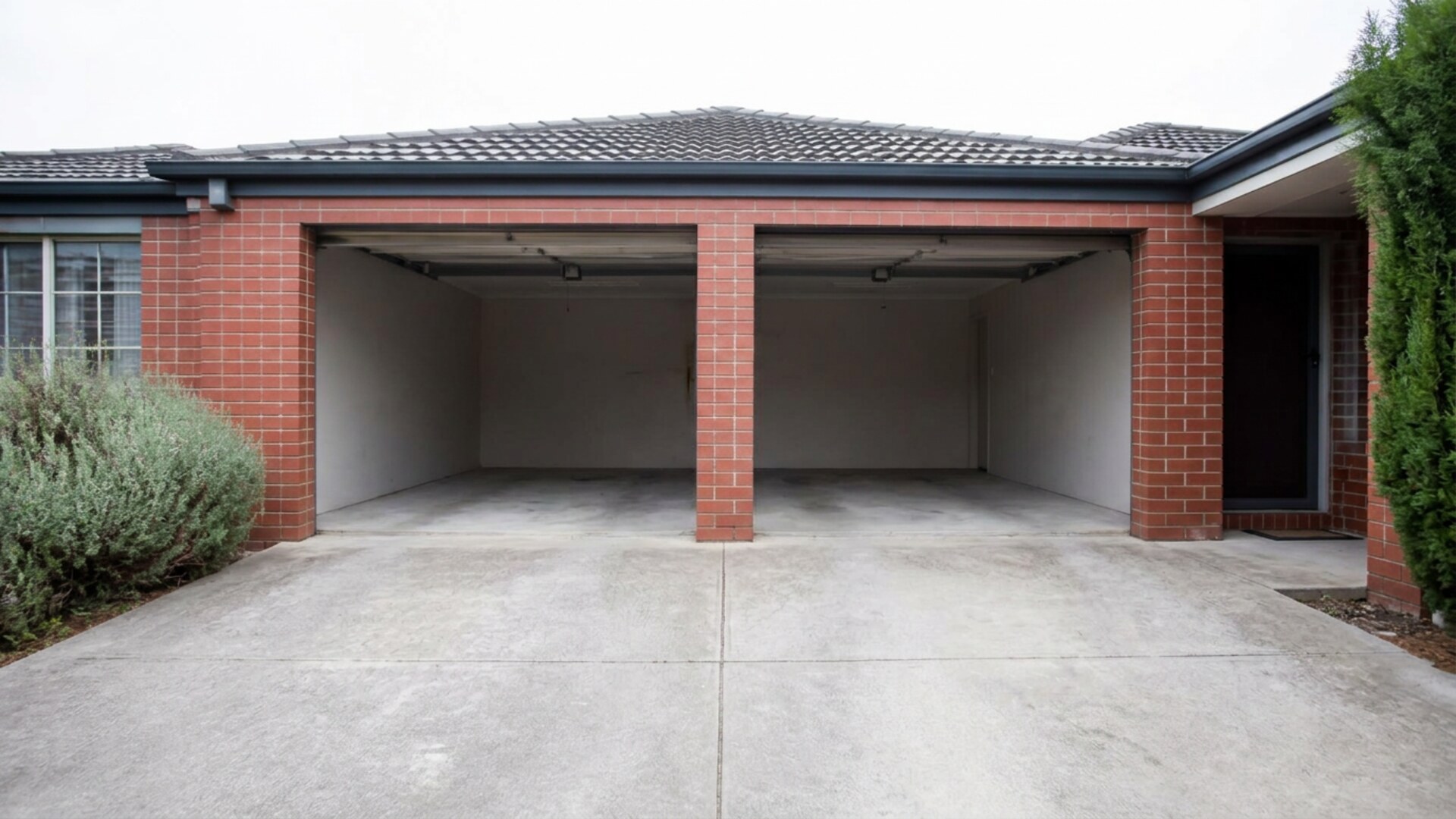 The same Melbourne driveway and garage completely cleared and swept after Urban Junk Removal